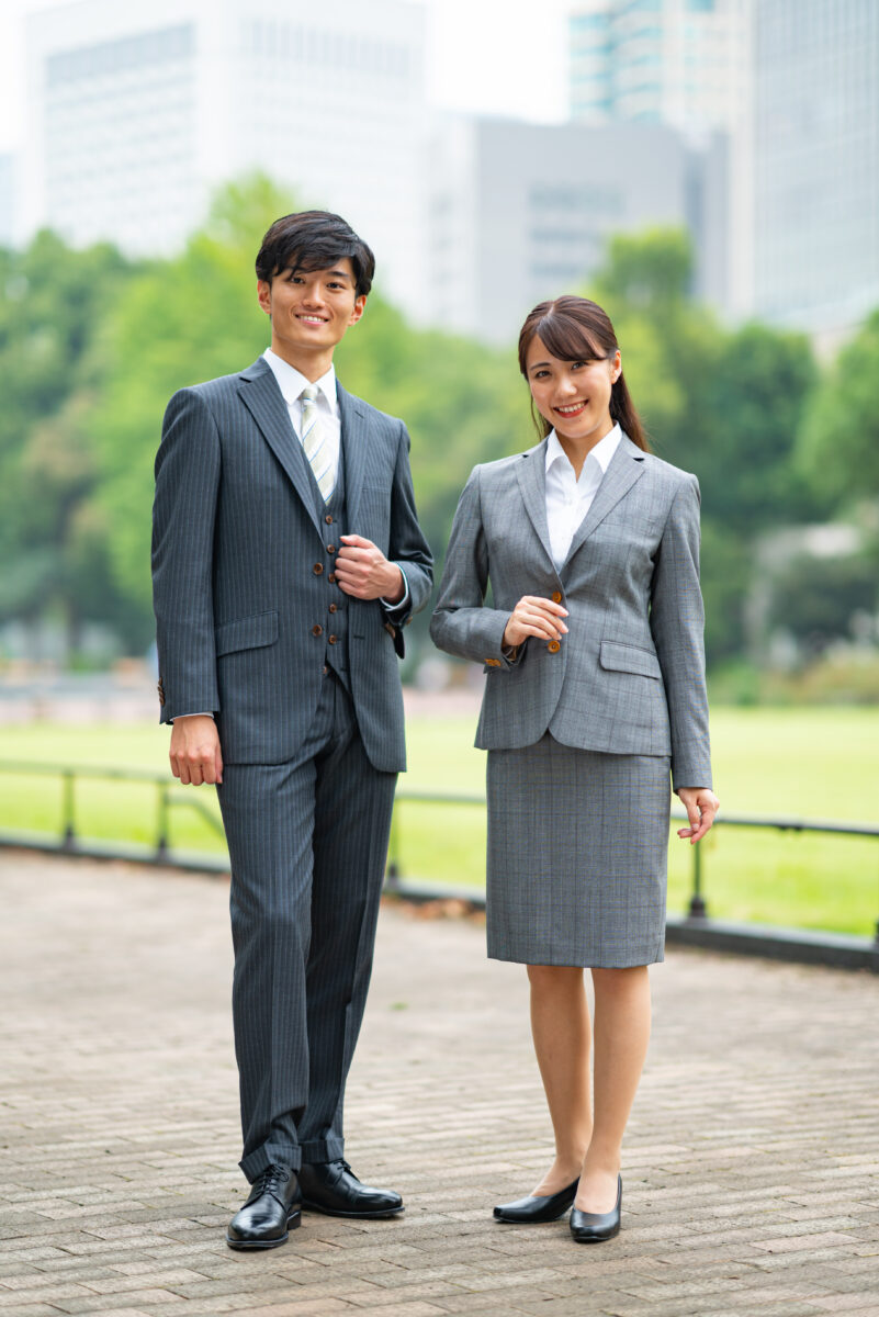 men and women in suits